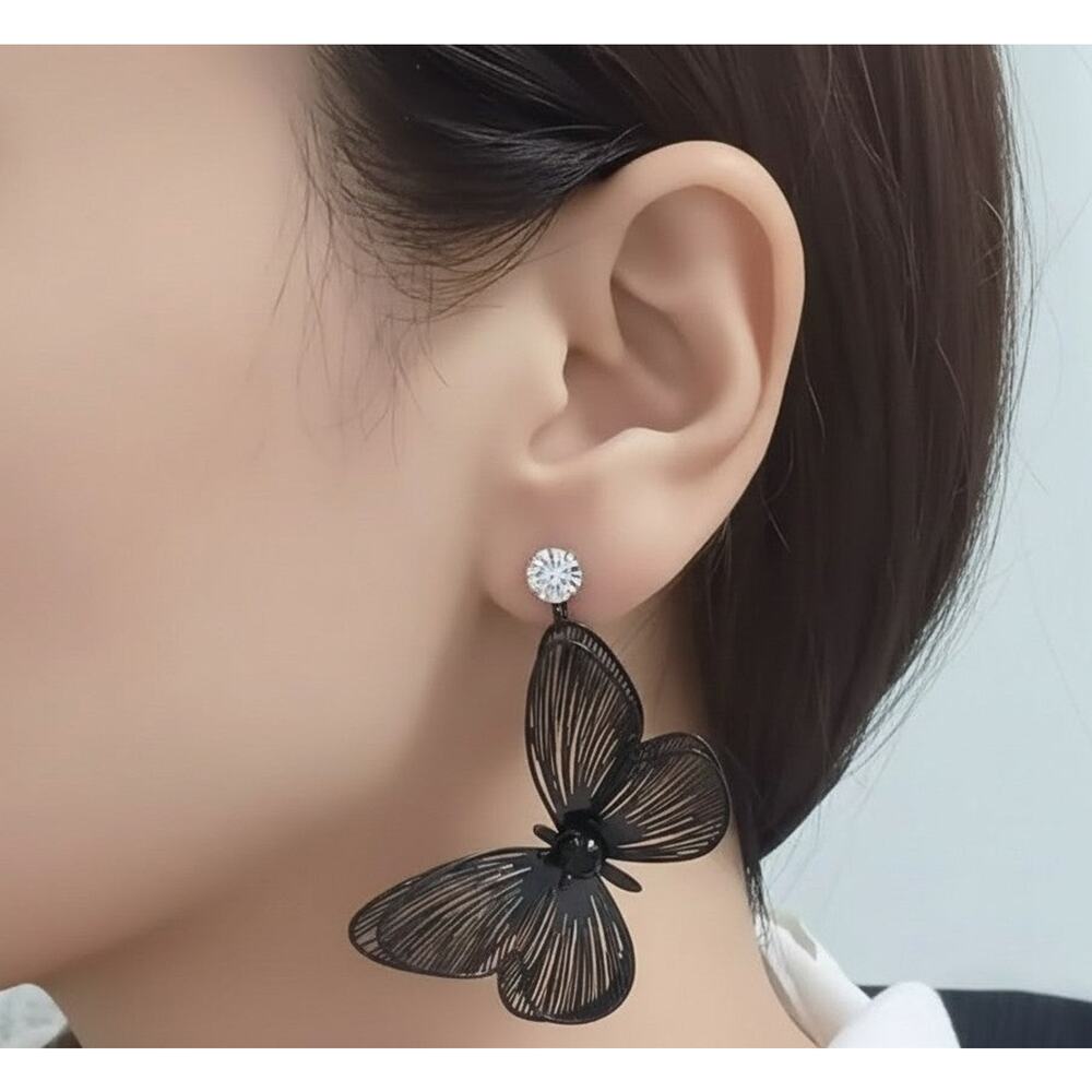 Clip on 2 1/2" black cutout dangle layered butterfly earrings with black stone